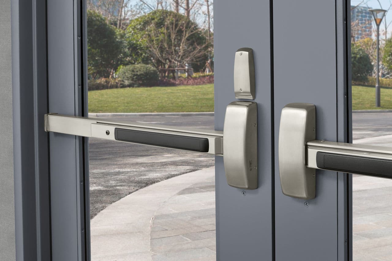 Locksmith installing commercial door hardware in Charleston, SC