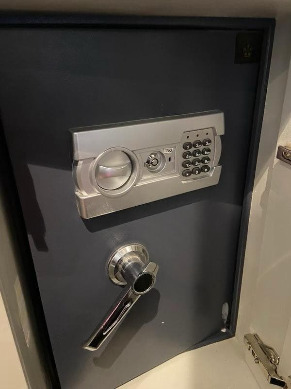 Locksmith working on door lock