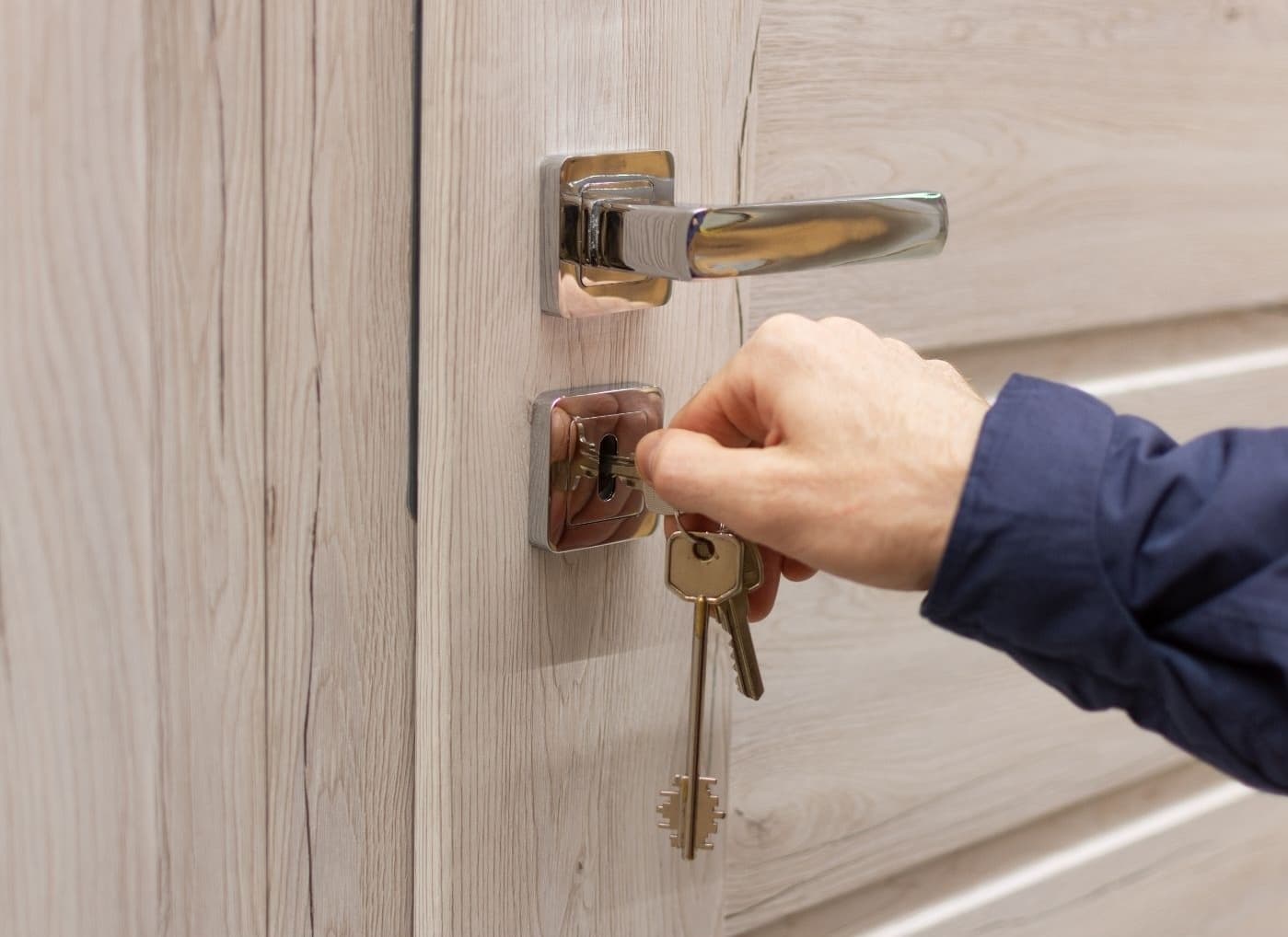 Residential locksmith installing a new deadbolt in Charleston, SC